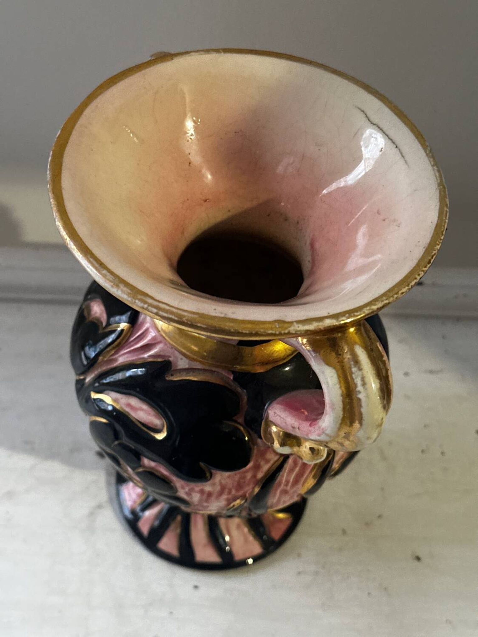 Vintage Vallauris vase amphora with relief floral decoration.