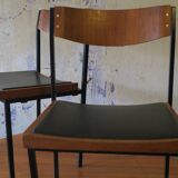 Pair of teak and iron stacking chairs, 1960s