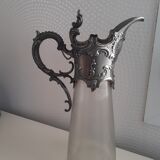 Old glass and tin ewer