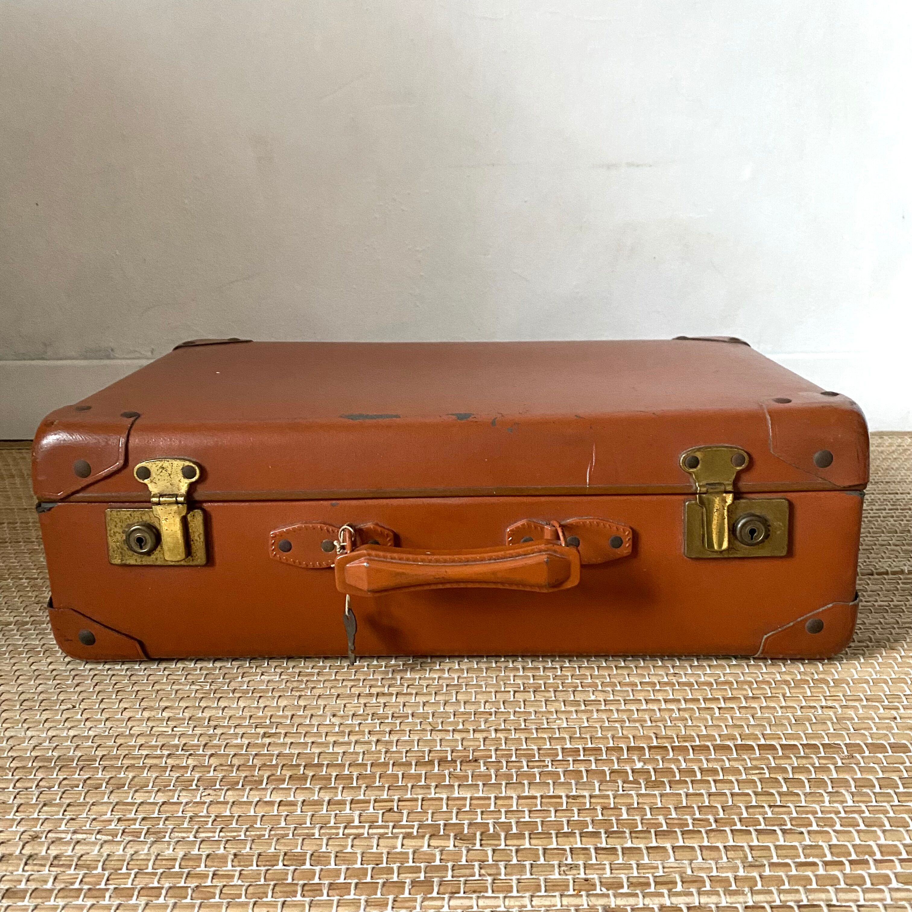 Antique suitcase and its key