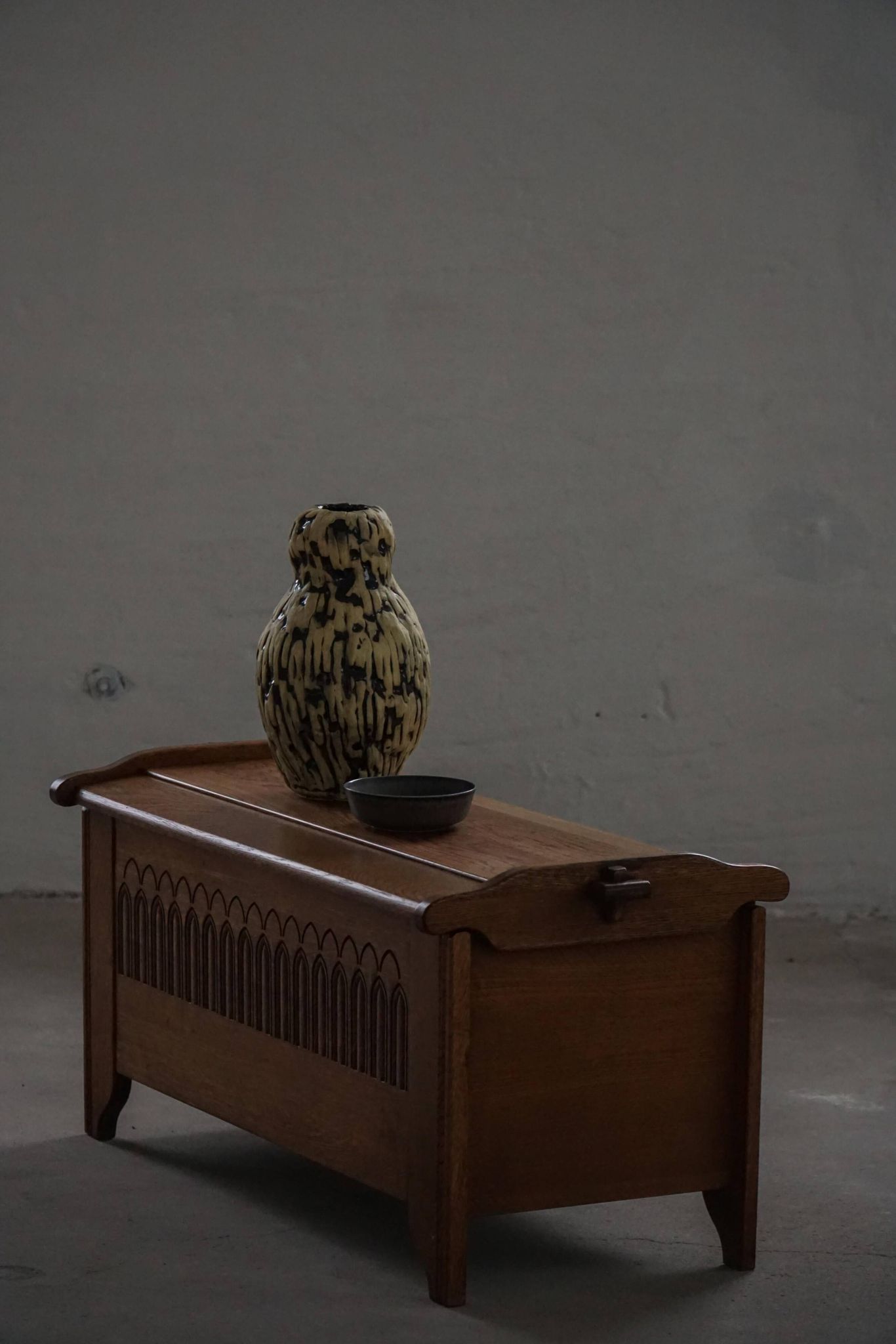 Modern Danish oak commode with decorative relief sculpture, mid-20th century.