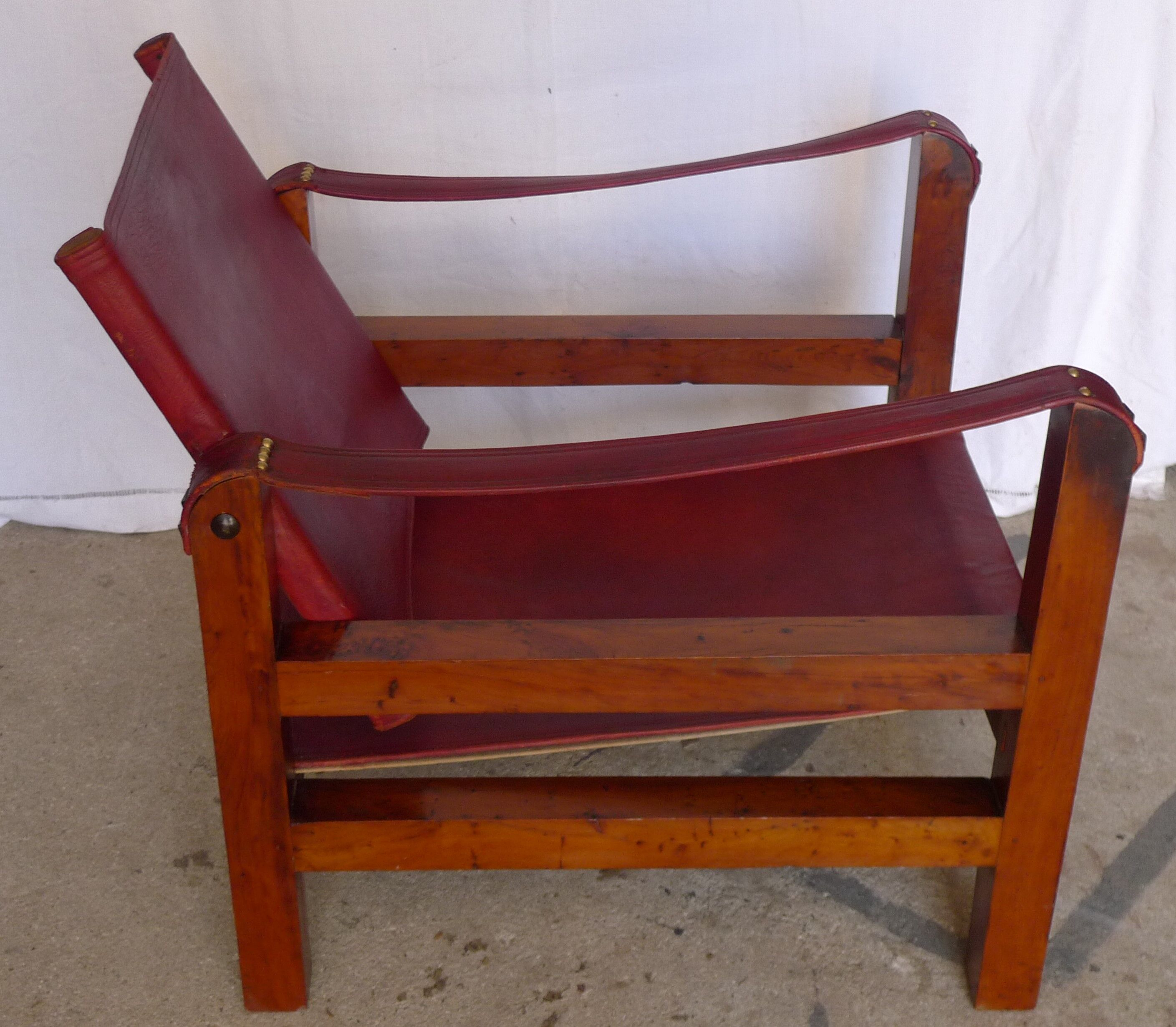 Leather and wood relaxed armchair