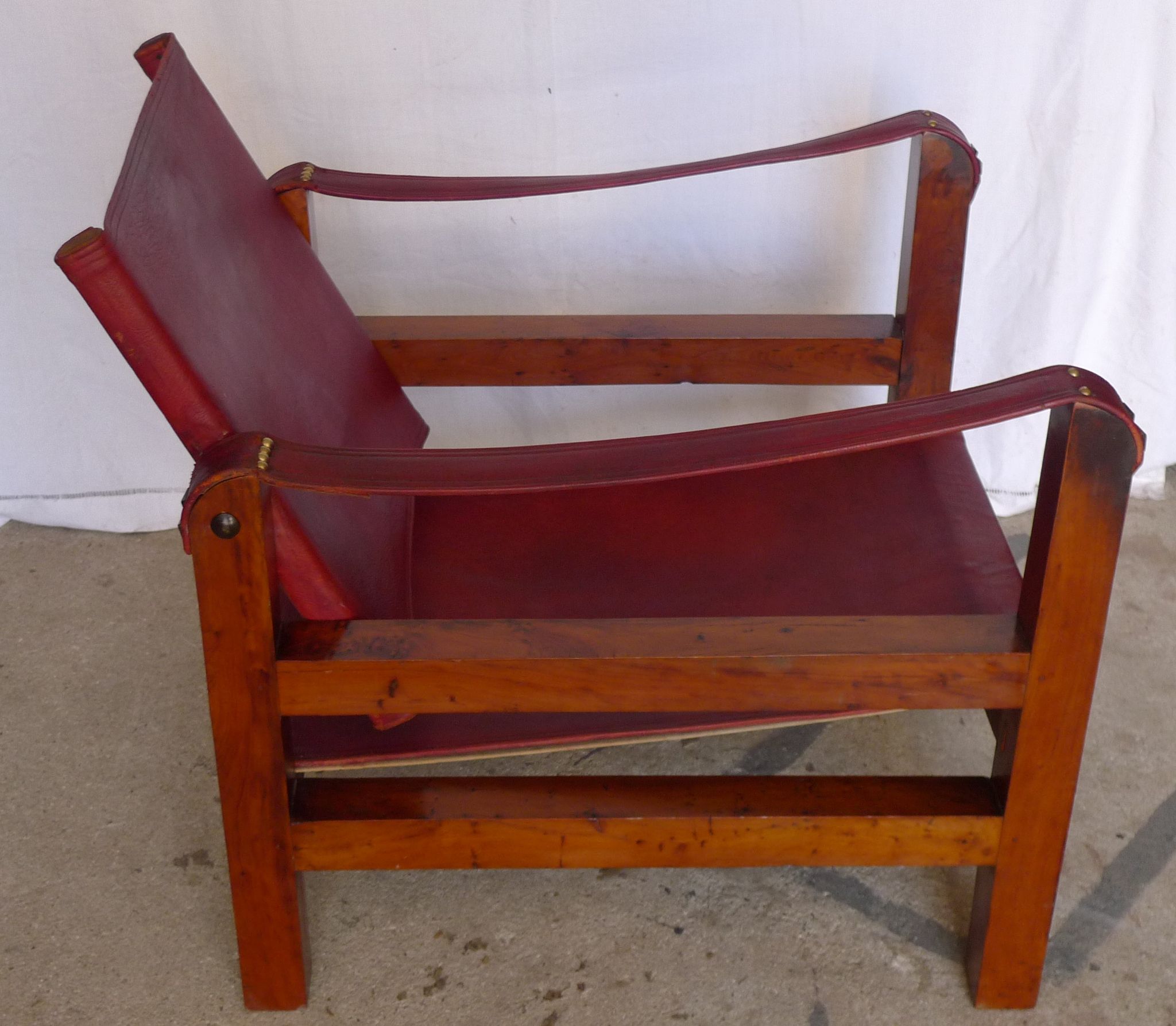 Leather and wood relaxed armchair