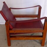 Leather and wood relaxed armchair