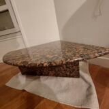 Marbled stone corner table.