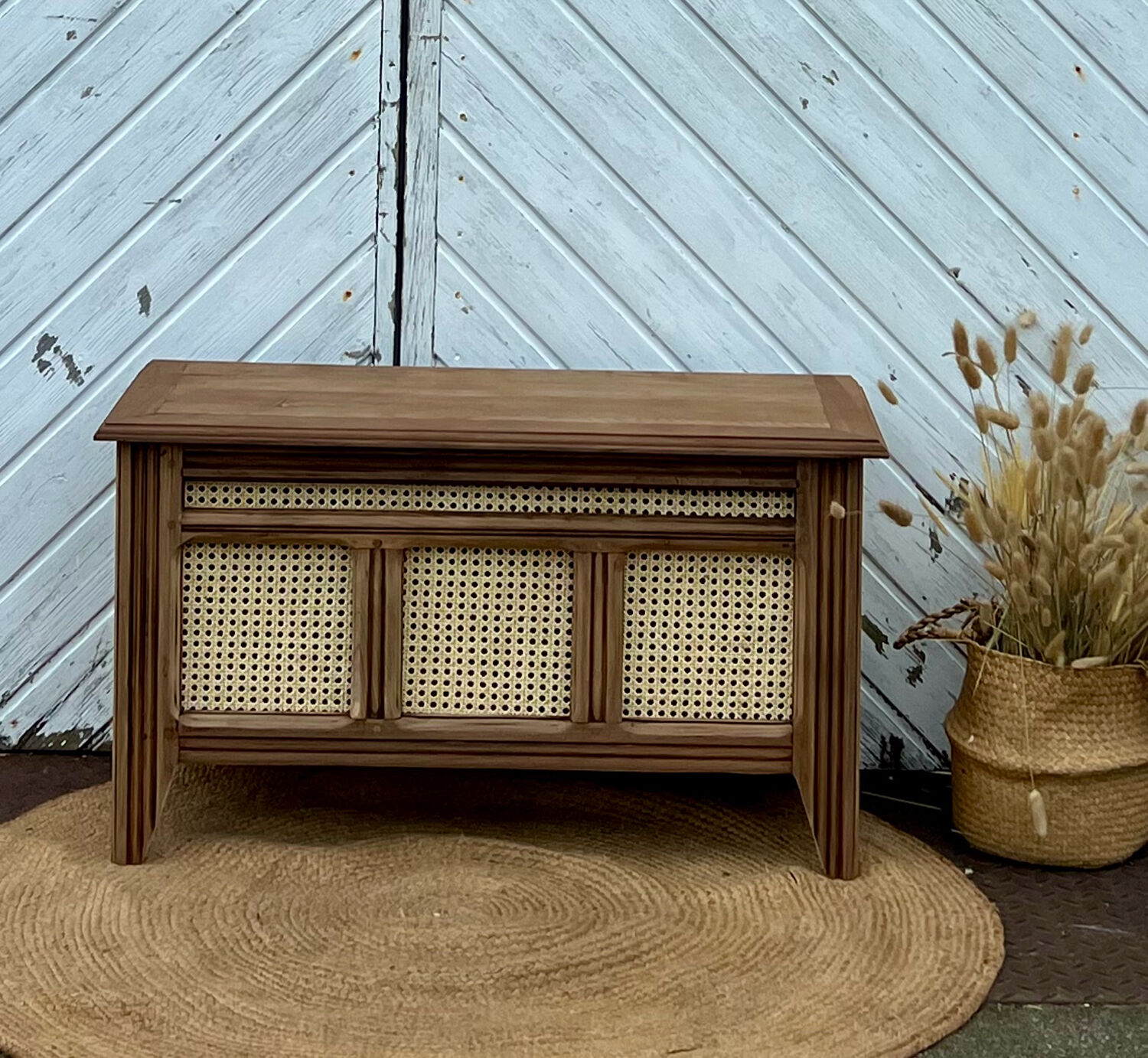 Antique oak chest with raw wood and cane work.