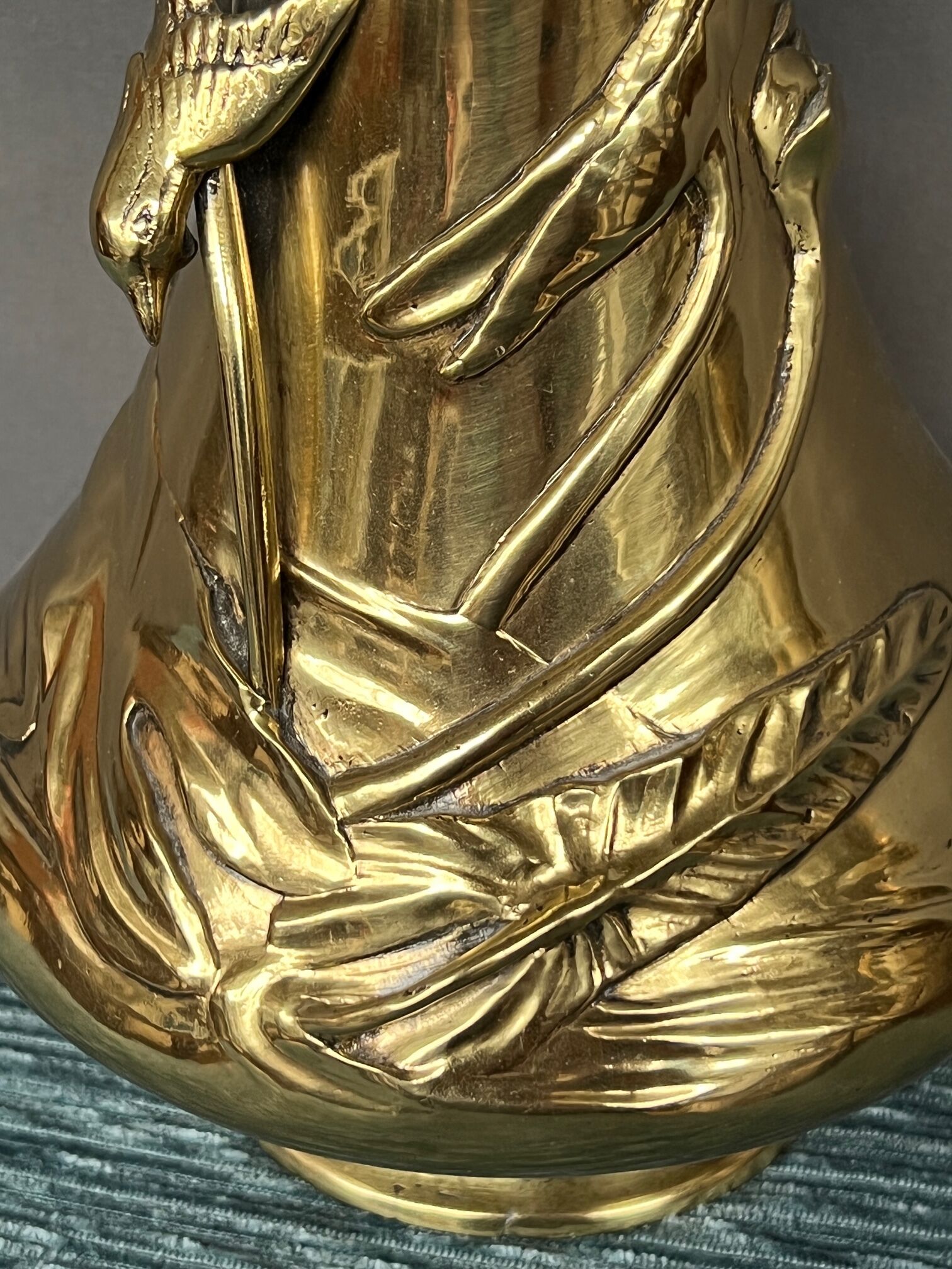 Massive bronze vase, decorated with bird figures and poppy flower.