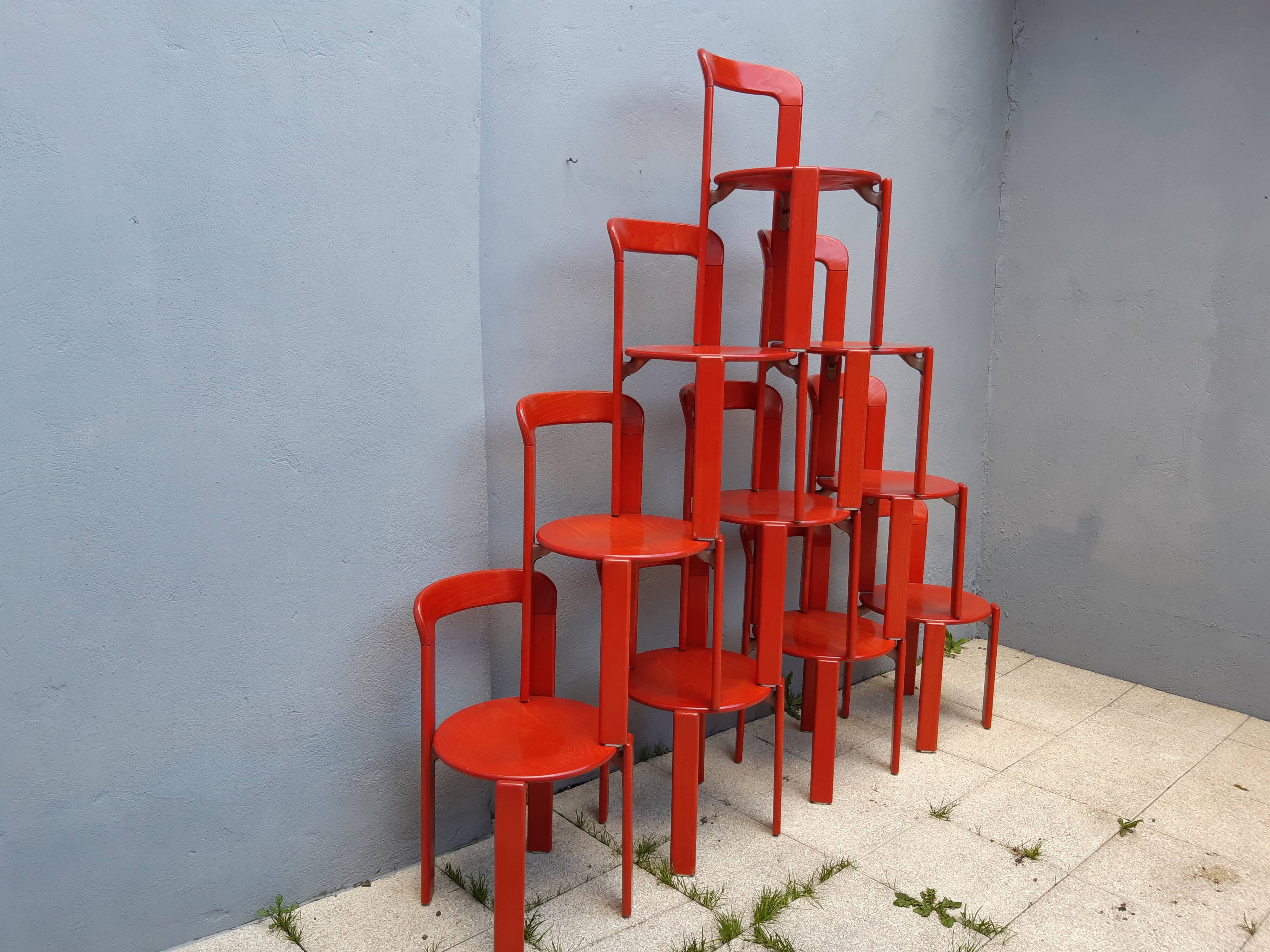Set of 10 red wooden chairs by Bruno Rey for Kusch&Co