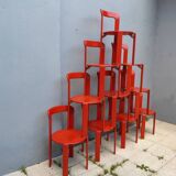 Set of 10 red wooden chairs by Bruno Rey for Kusch&Co