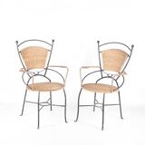 Pair of iron and rattan armchairs
