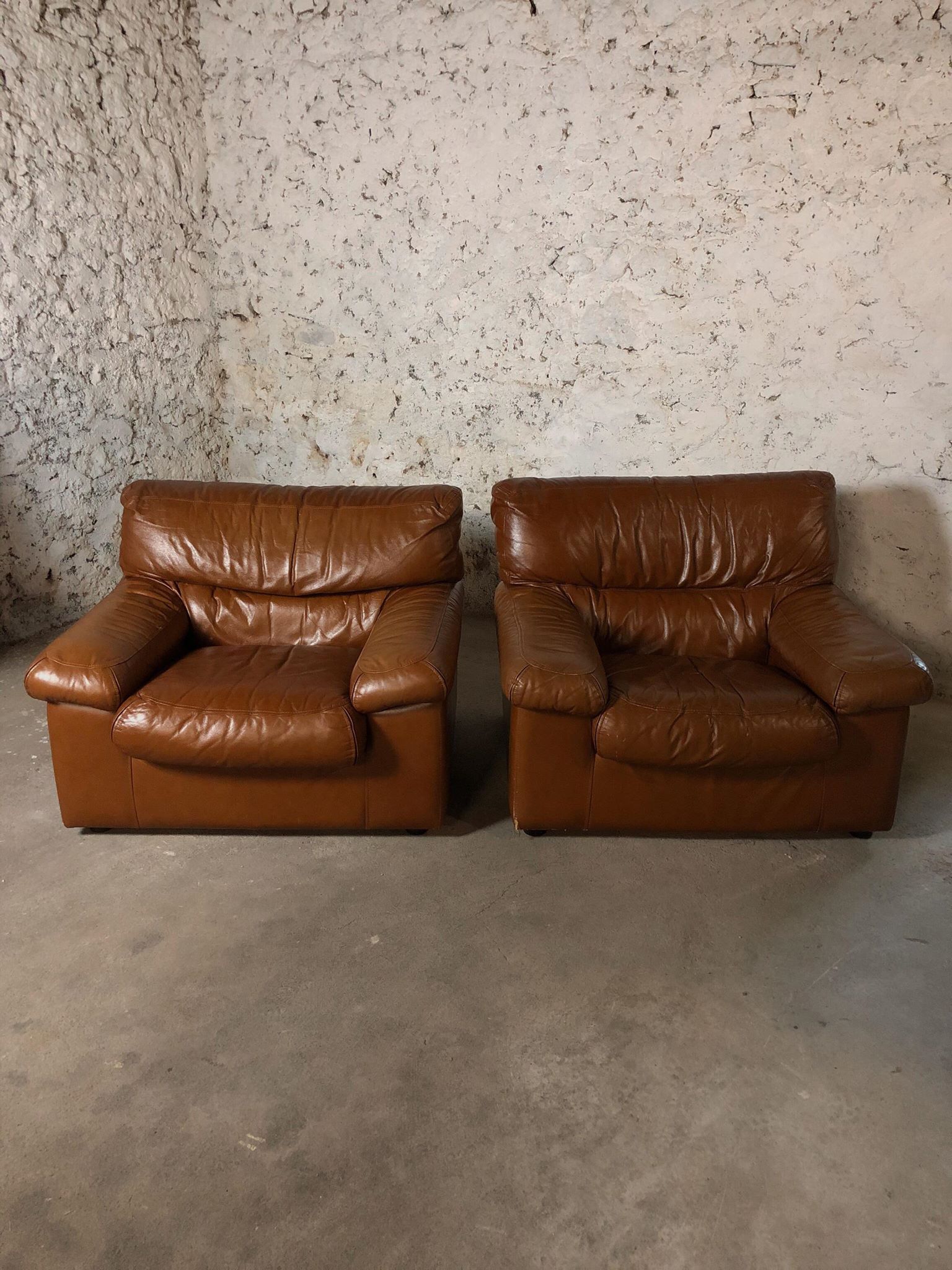Pair camel leather armchairs