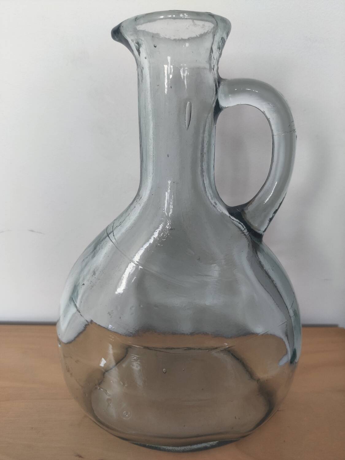 Antique carafe made of thick glass