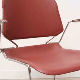 Vintage Matrix design chair by Thomas Tolleson with red armrests