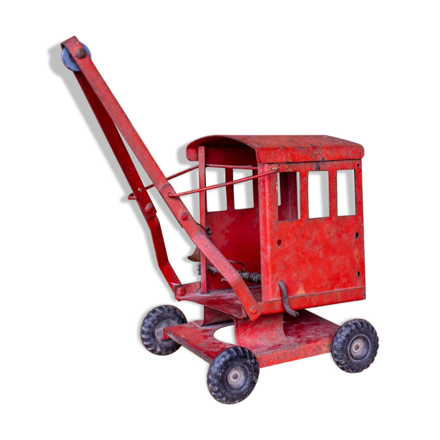 Old toy truck crane in sheet metal