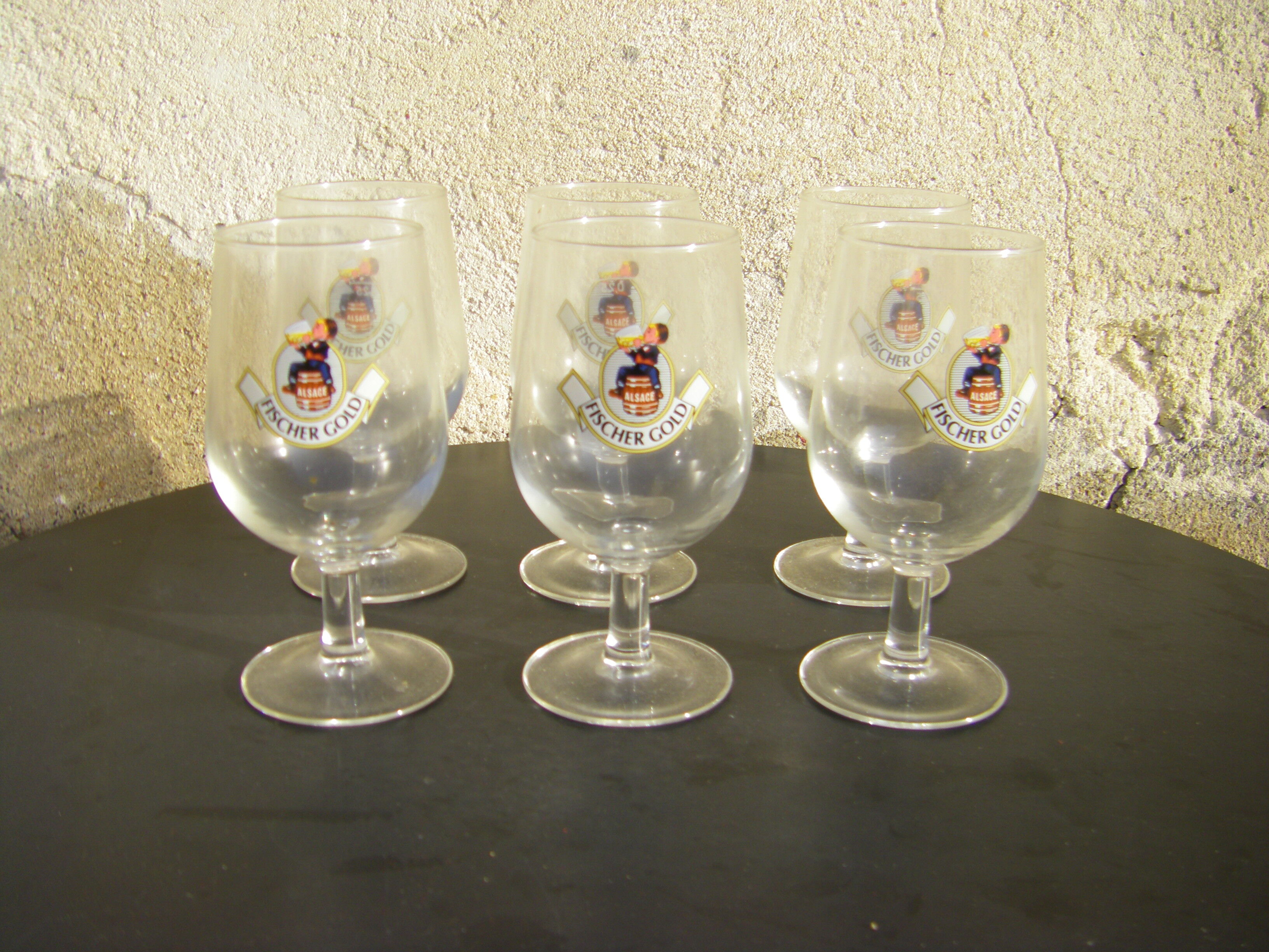 Six Fischer Gold beer glasses
