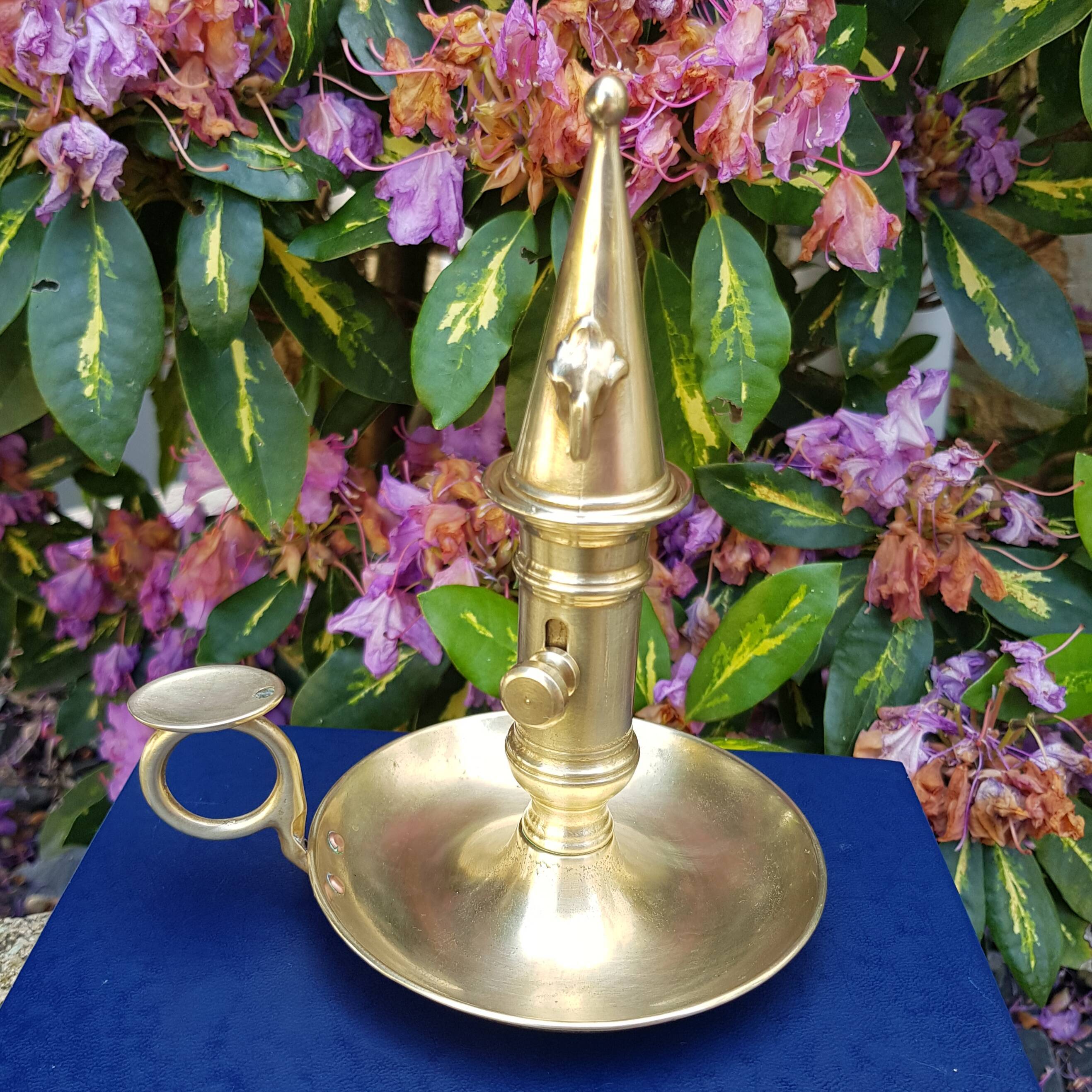 Cellar rat candle holder and brass extinguisher