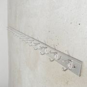 Wall-mounted aluminium coat rack of 225 cm with 16 double hooks, 1960s.