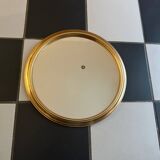 Round golden mirror