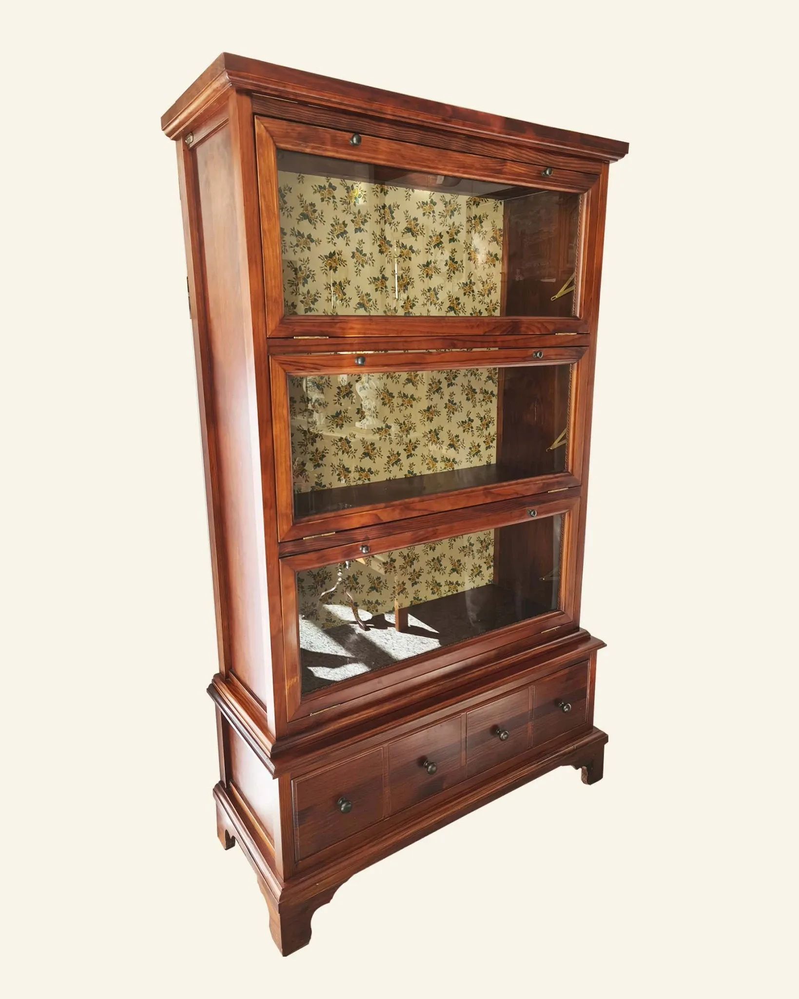 Globe-Wernicke display cabinet in walnut, 3 modules and drawer.