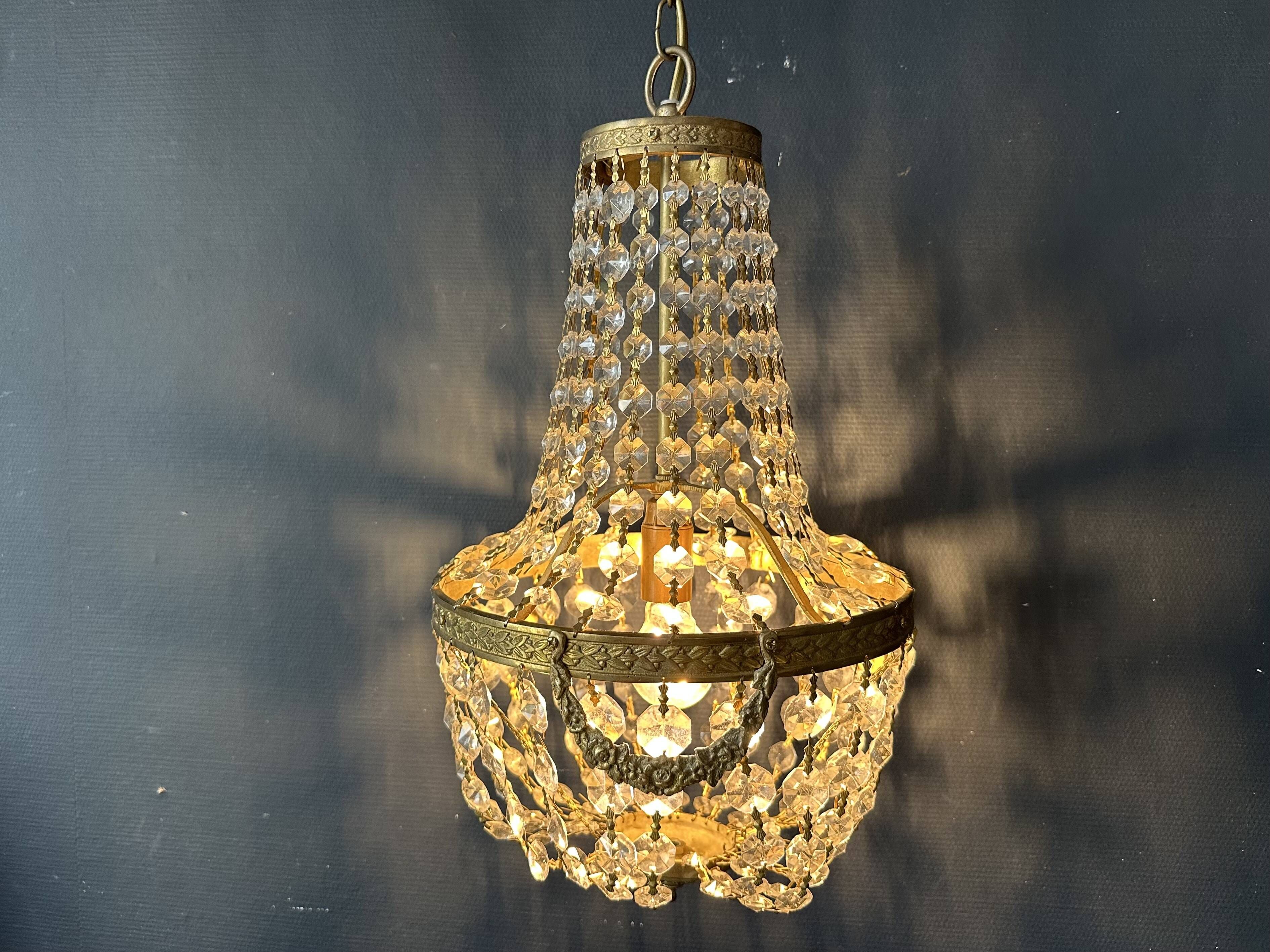 Golden bronze hot air balloon chandelier with glass pendants, mid-20th century.