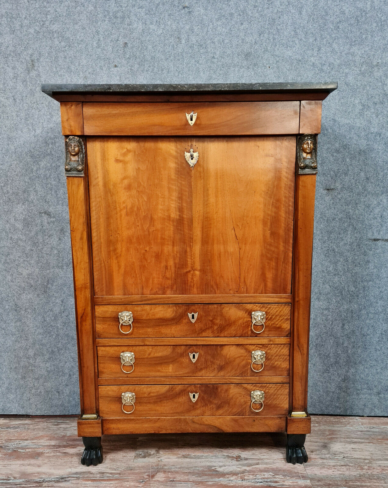Secretary empire era with caryatid in blond mahogany around 1810