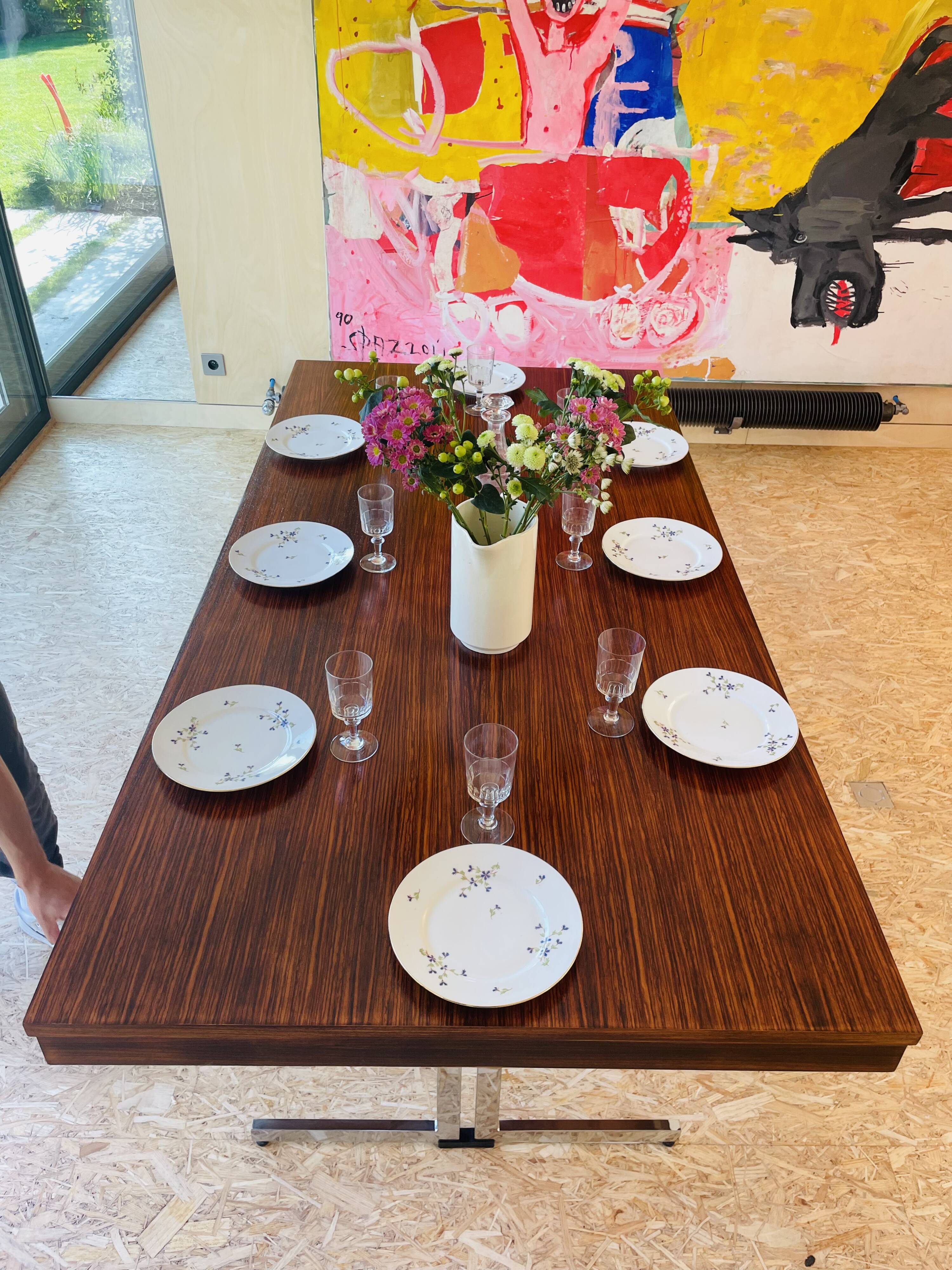 Desk that can serve as a dining table.