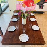 Desk that can serve as a dining table.