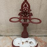 Patinated cast metal umbrella holder