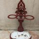 Patinated cast metal umbrella holder