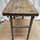 Table pliante d'atelier en teck et fer forgé