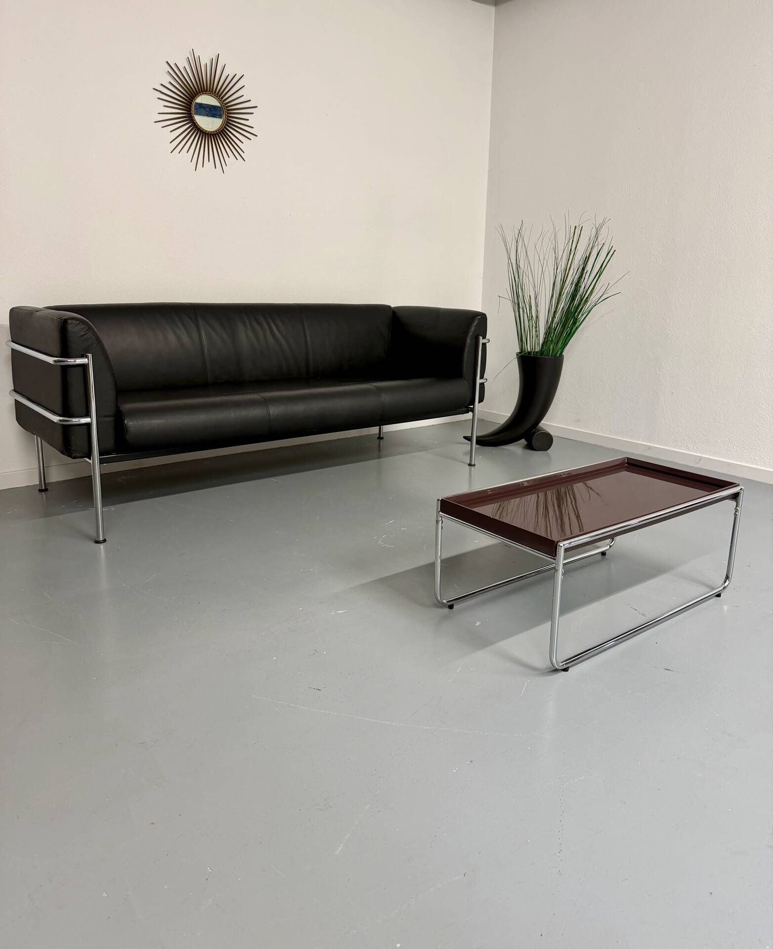 Three-seater tubular chrome and black leather sofa by Kébé, Denmark 80