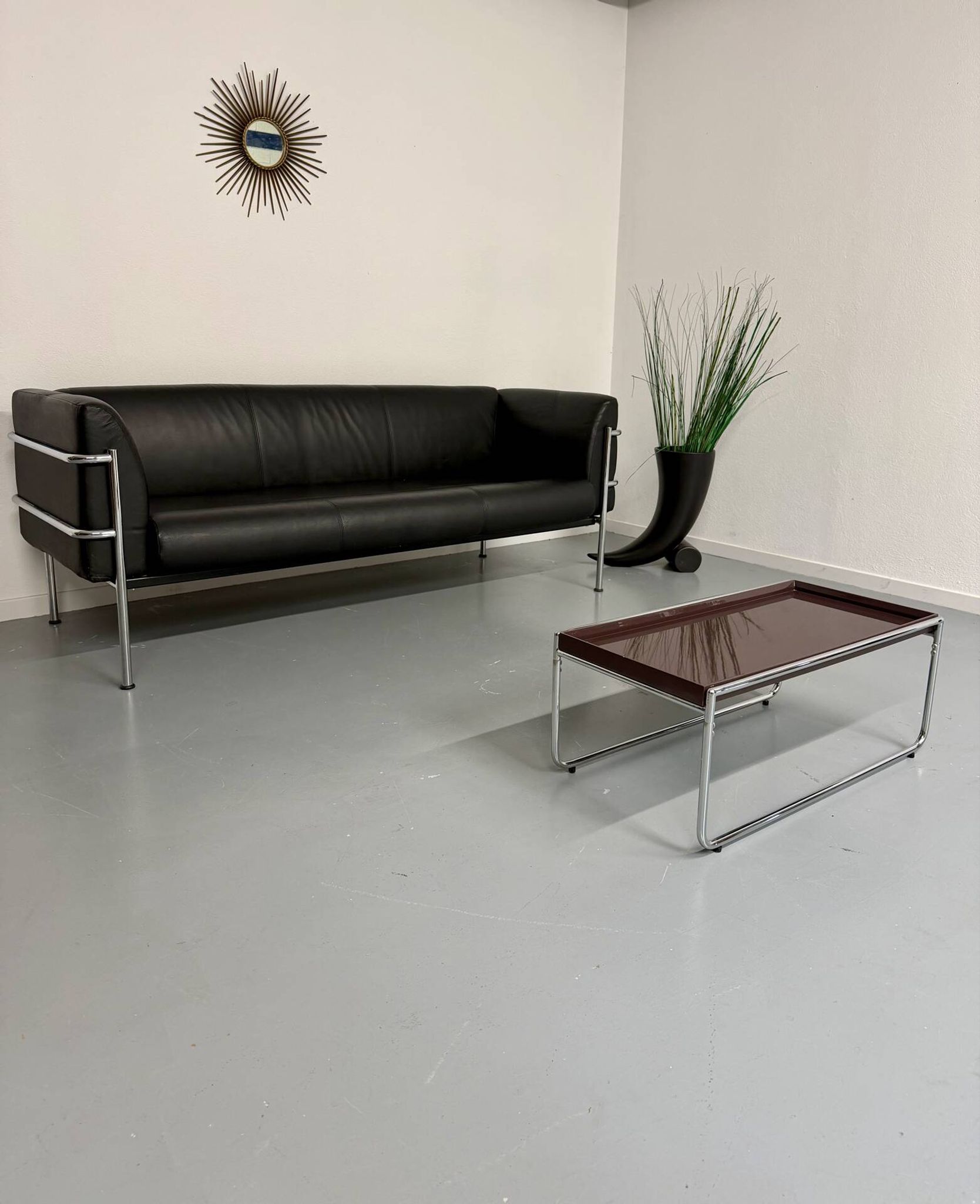 Three-seater tubular chrome and black leather sofa by Kébé, Denmark 80