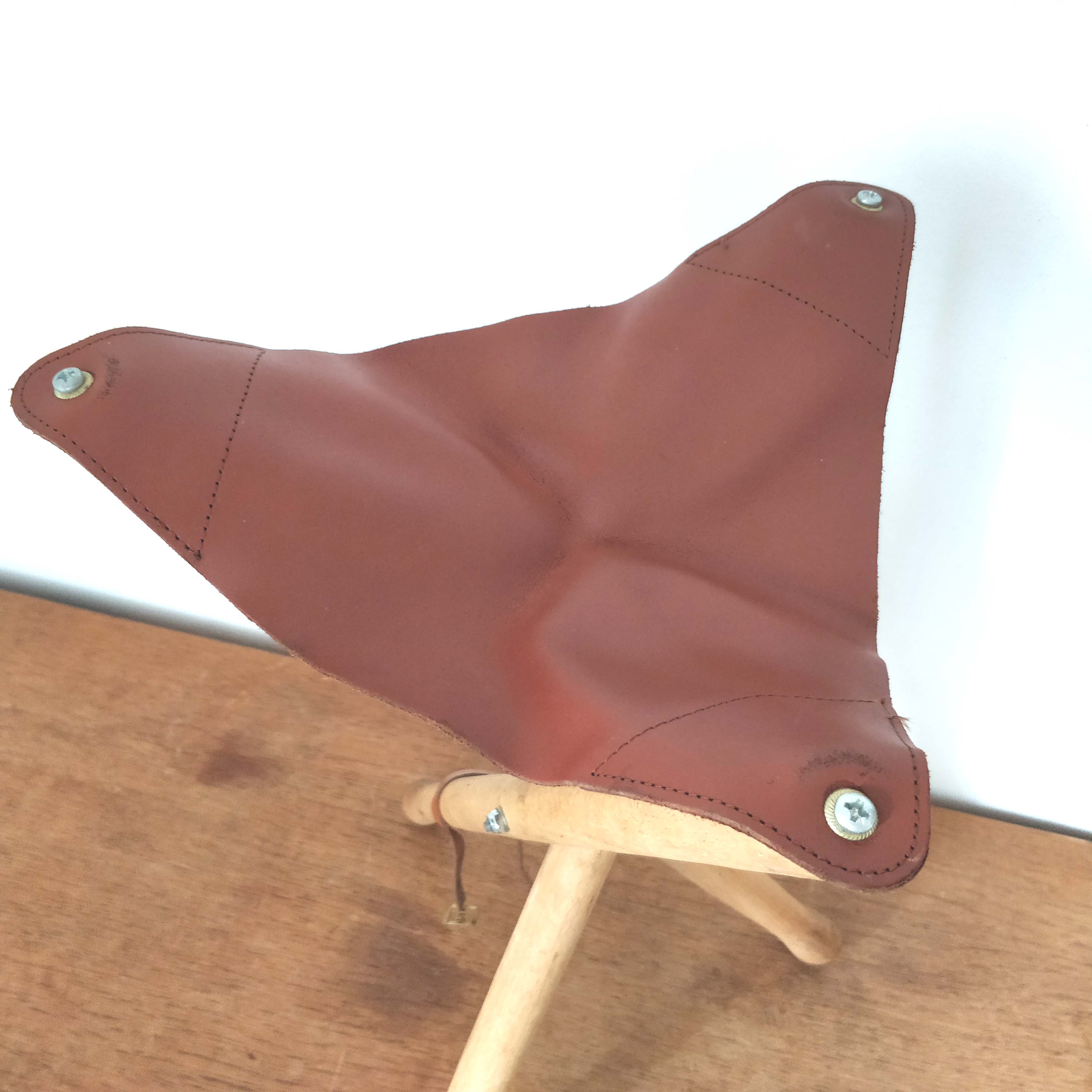 Folding wooden and leather stool