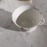 Antique flowered porcelain cup