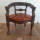 Fauteuil de bureau 1920 sculpté à tête de griffon