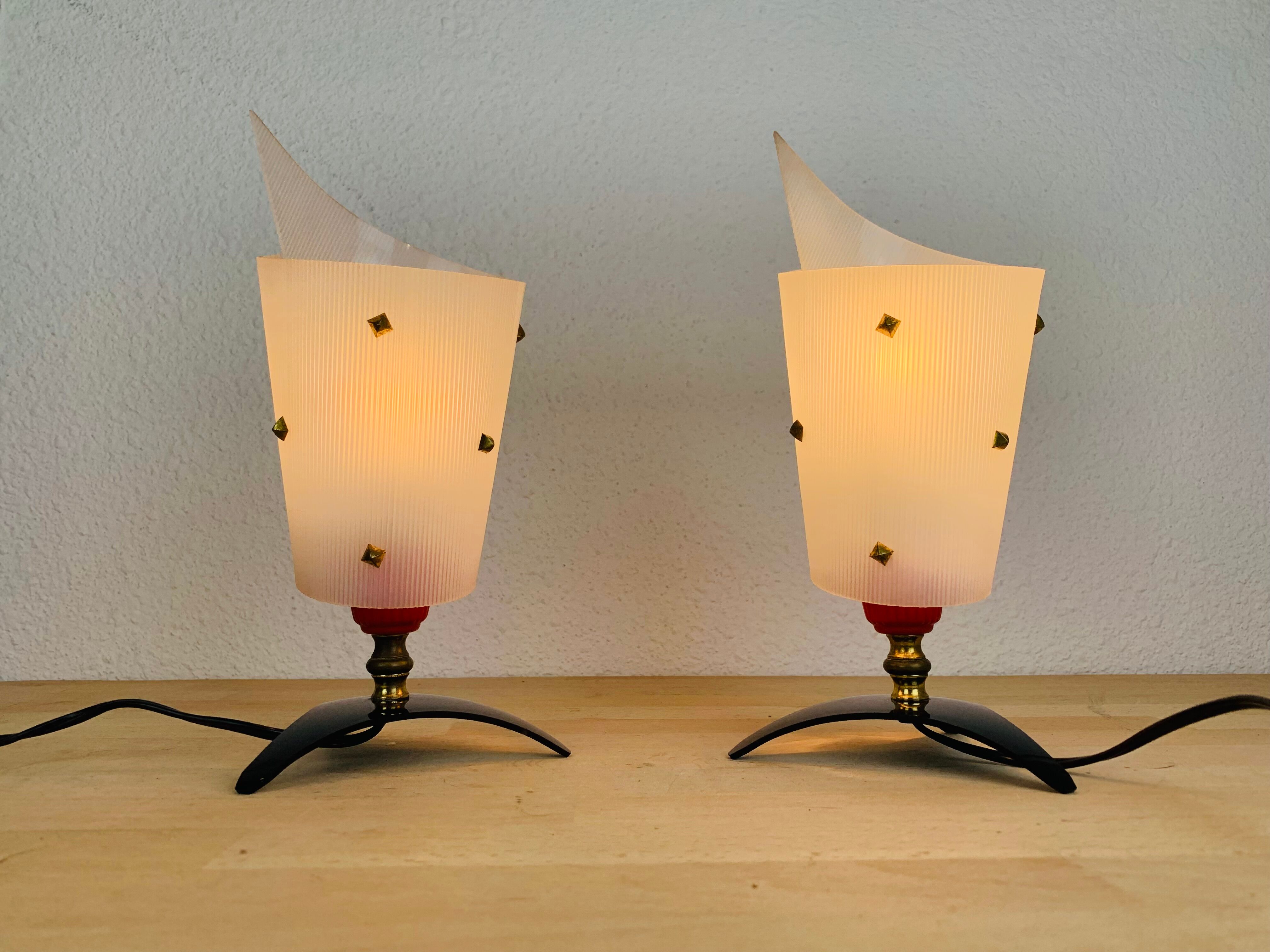 Pair of 50s plastic brass bedside lamps