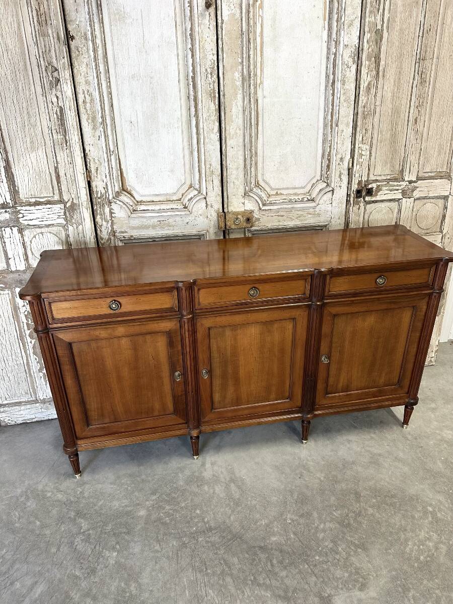 Louis XVI style enfilade in cherry wood, 20th century.