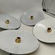 Suspensions in enamelled sheets