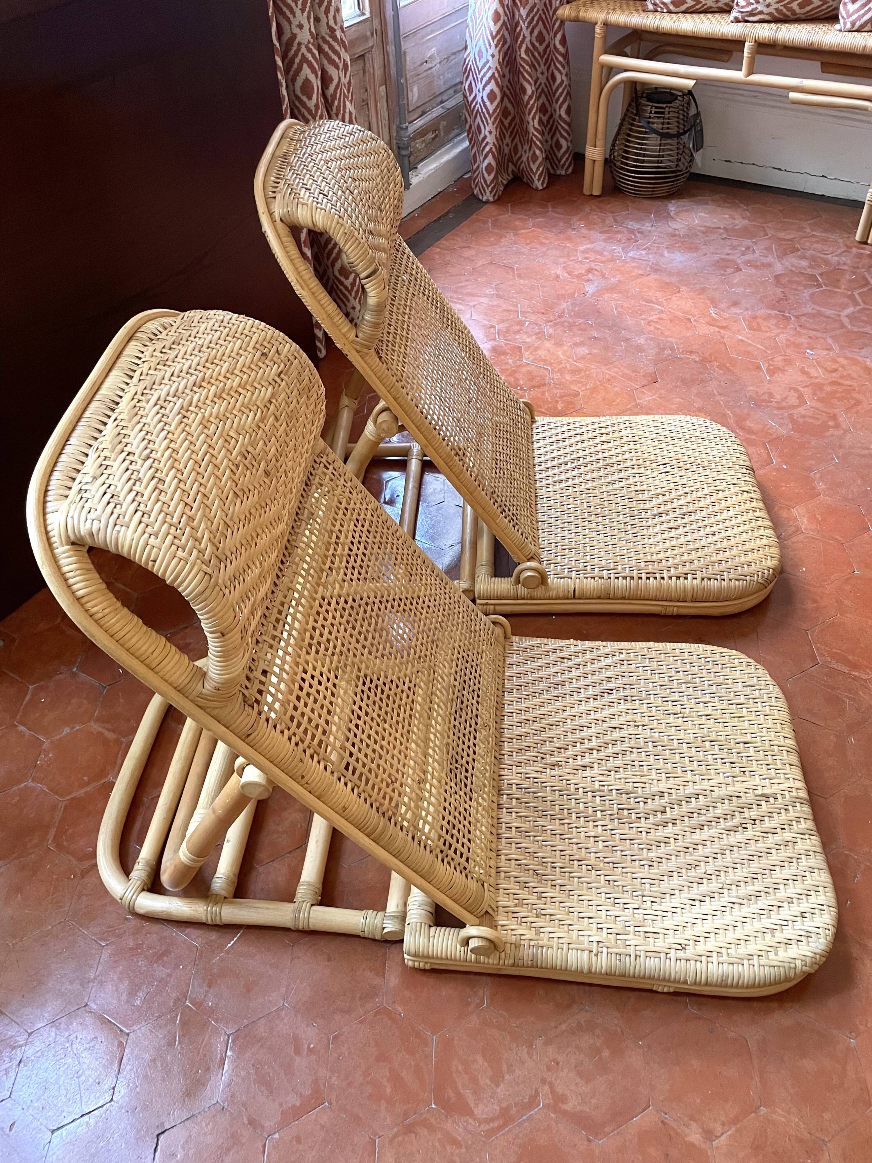 Paire de fauteuils pliables  en rotin