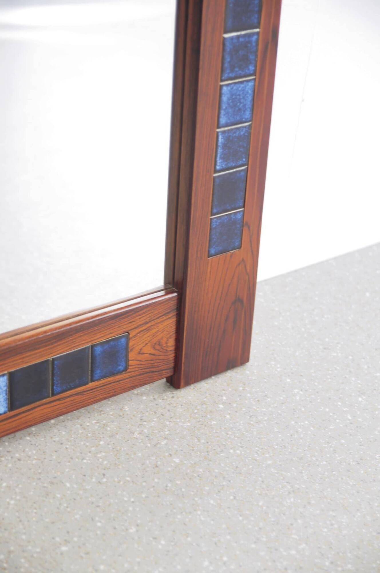 Rosewood mirror with blue ceramic tiles