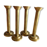 Series of 4 brass candlesticks