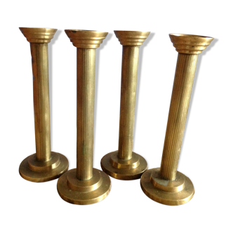 Series of 4 brass candlesticks