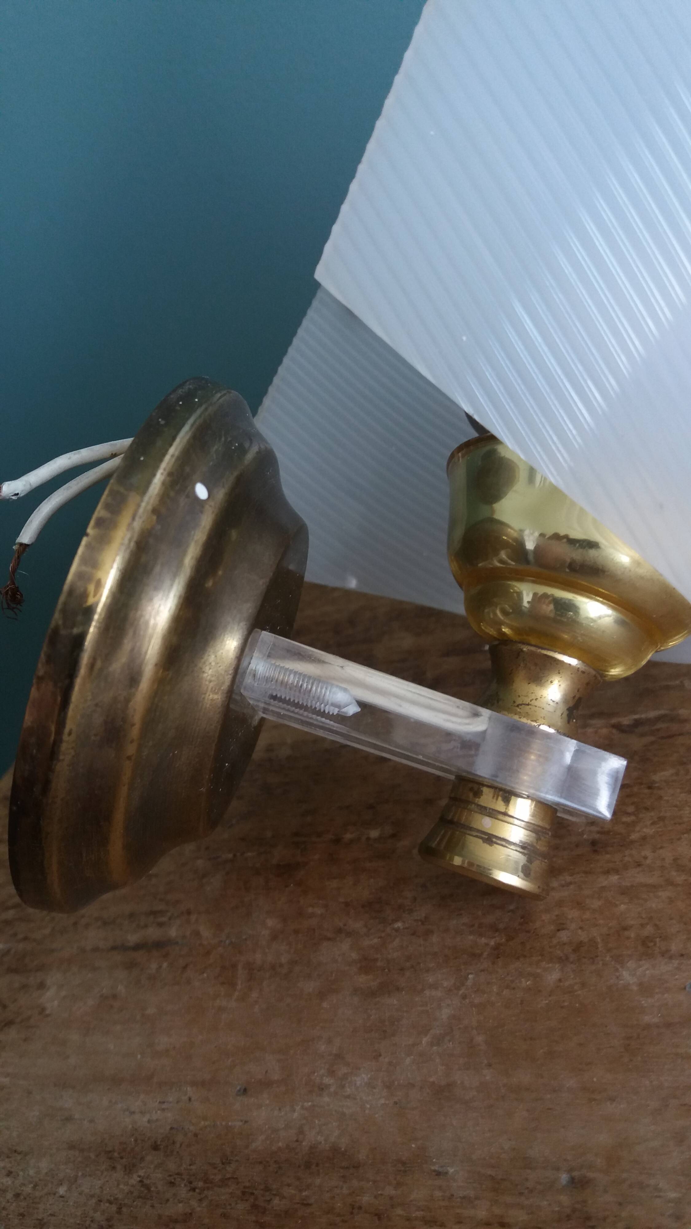 Golden metal appliques and plexiglass perspex in the style of Maison Lunel or Guariche.