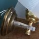 Golden metal appliques and plexiglass perspex in the style of Maison Lunel or Guariche.