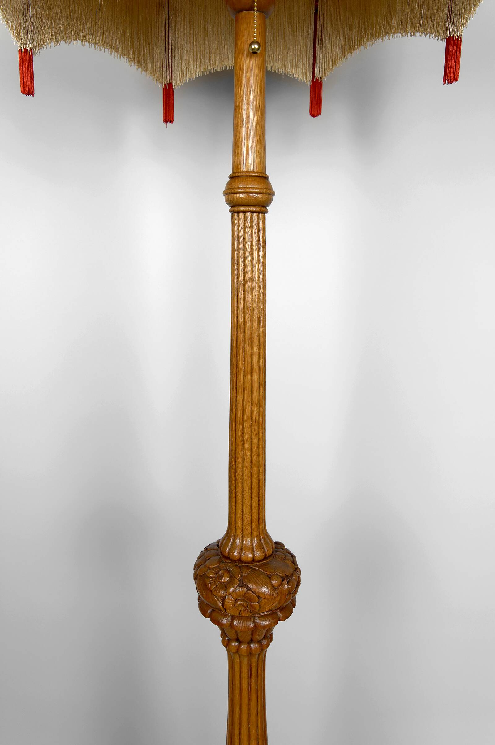 Important Art Deco carved oak floor lamp, France, circa 1920