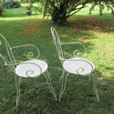 Pair of wrought iron armchairs