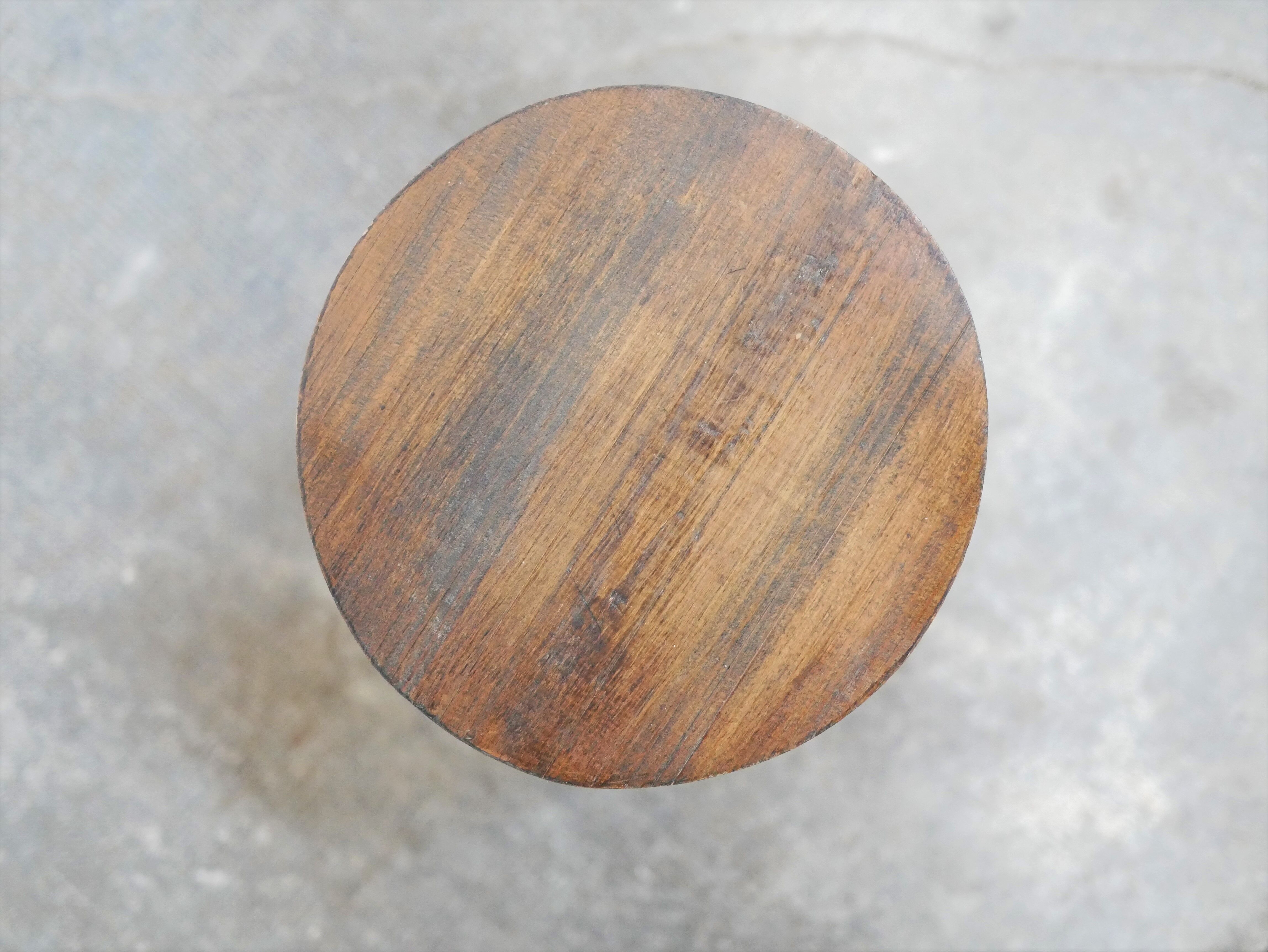 Vintage wooden tripod stool