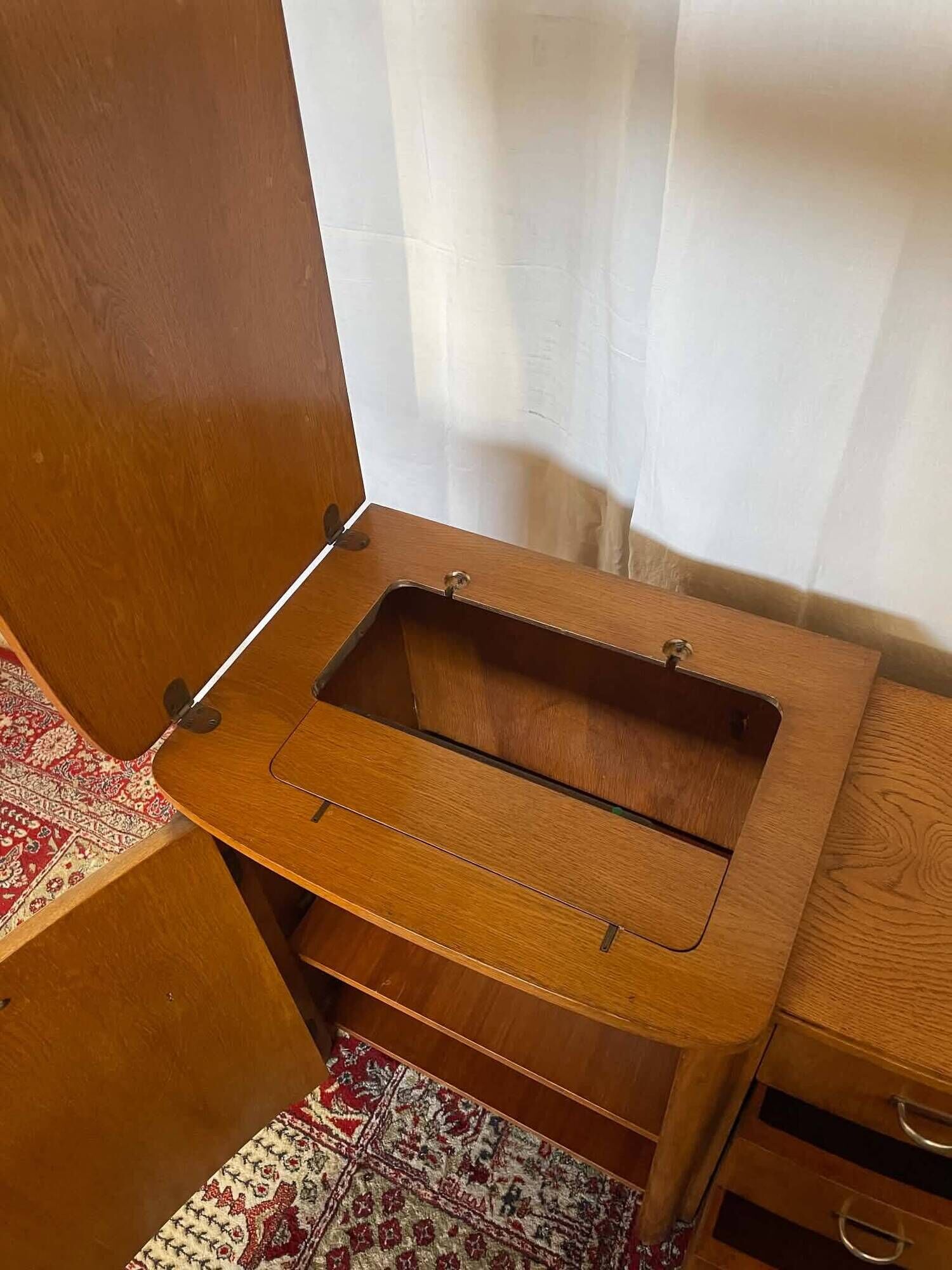 Old sewing cabinet with drawers