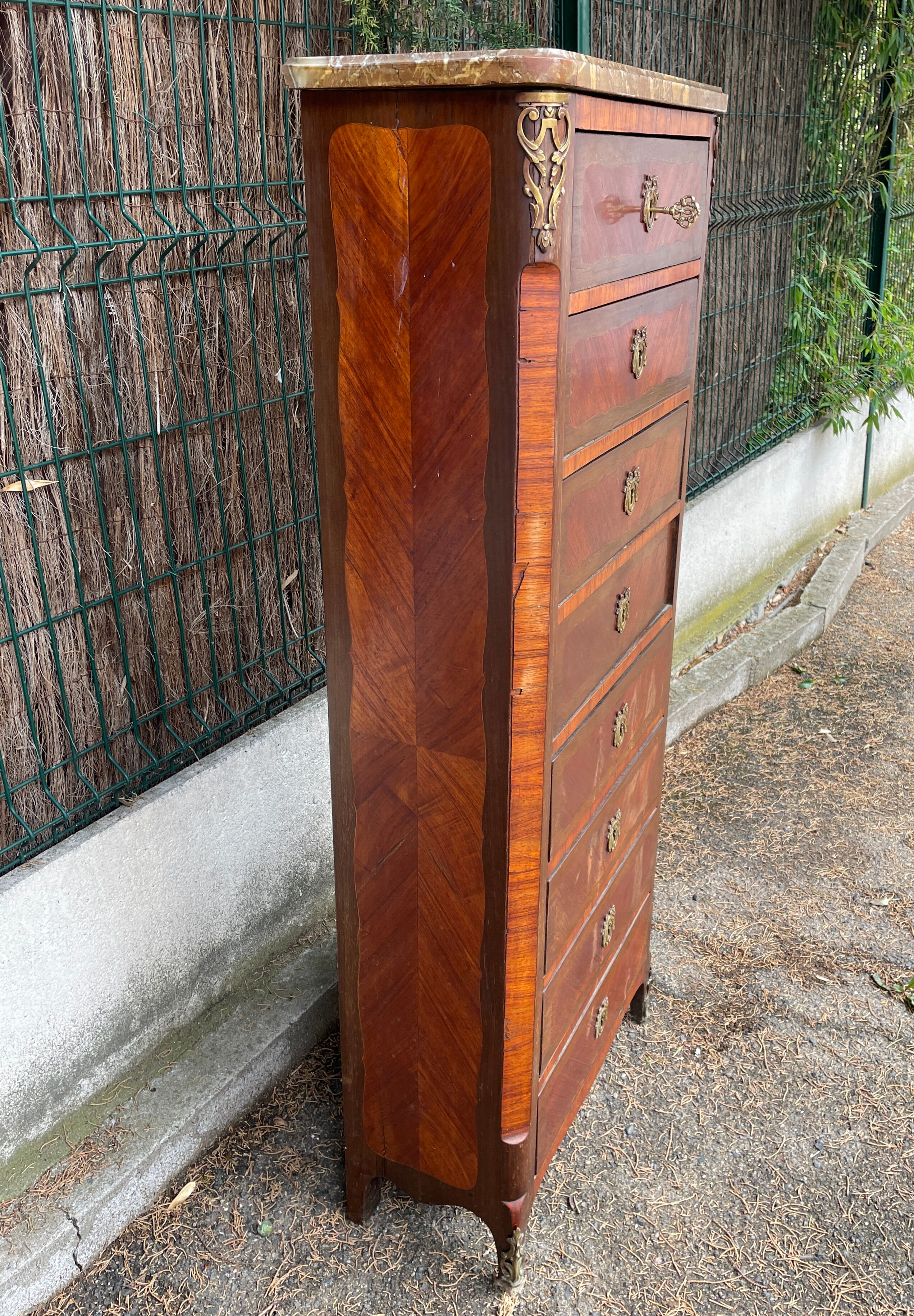 Weekly / chiffonnier, chest of drawers with 8 drawers in marquetry, marble top.