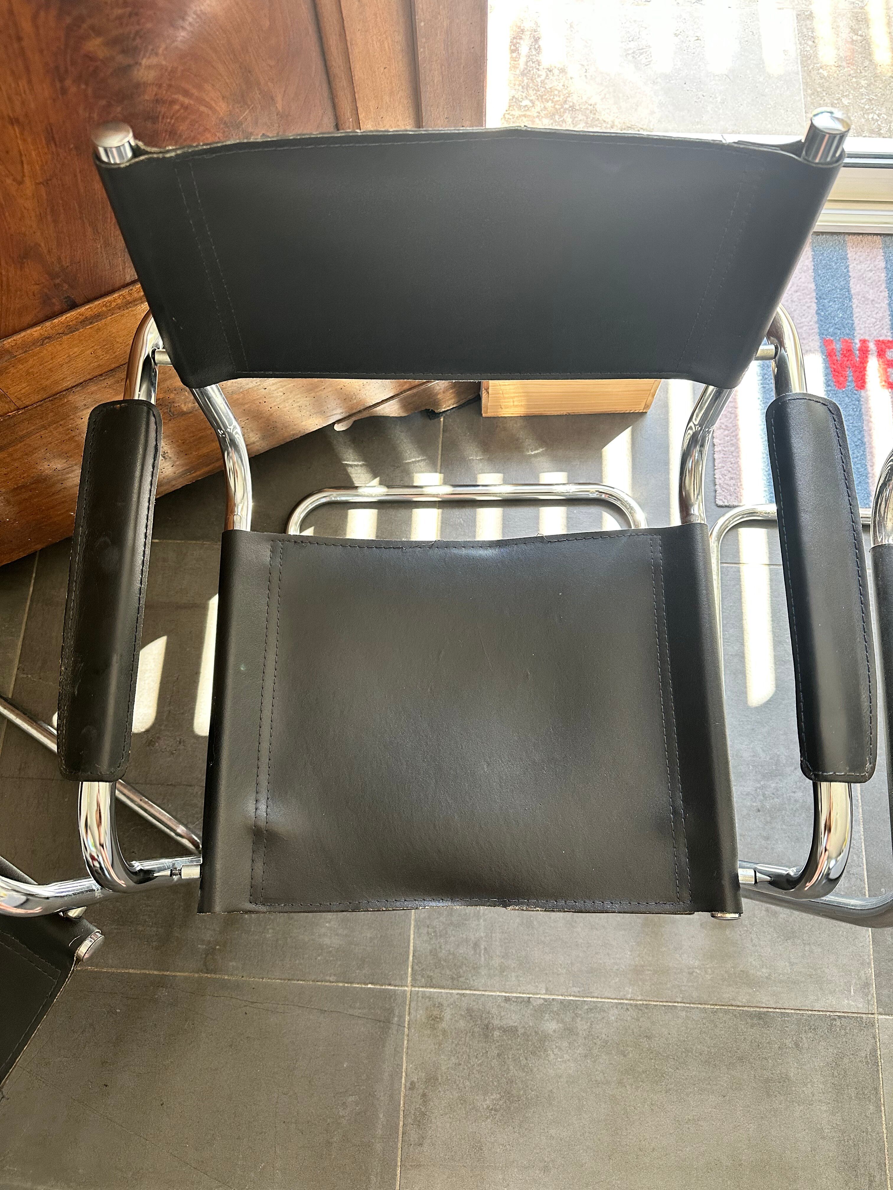 4 chrome tubular chairs